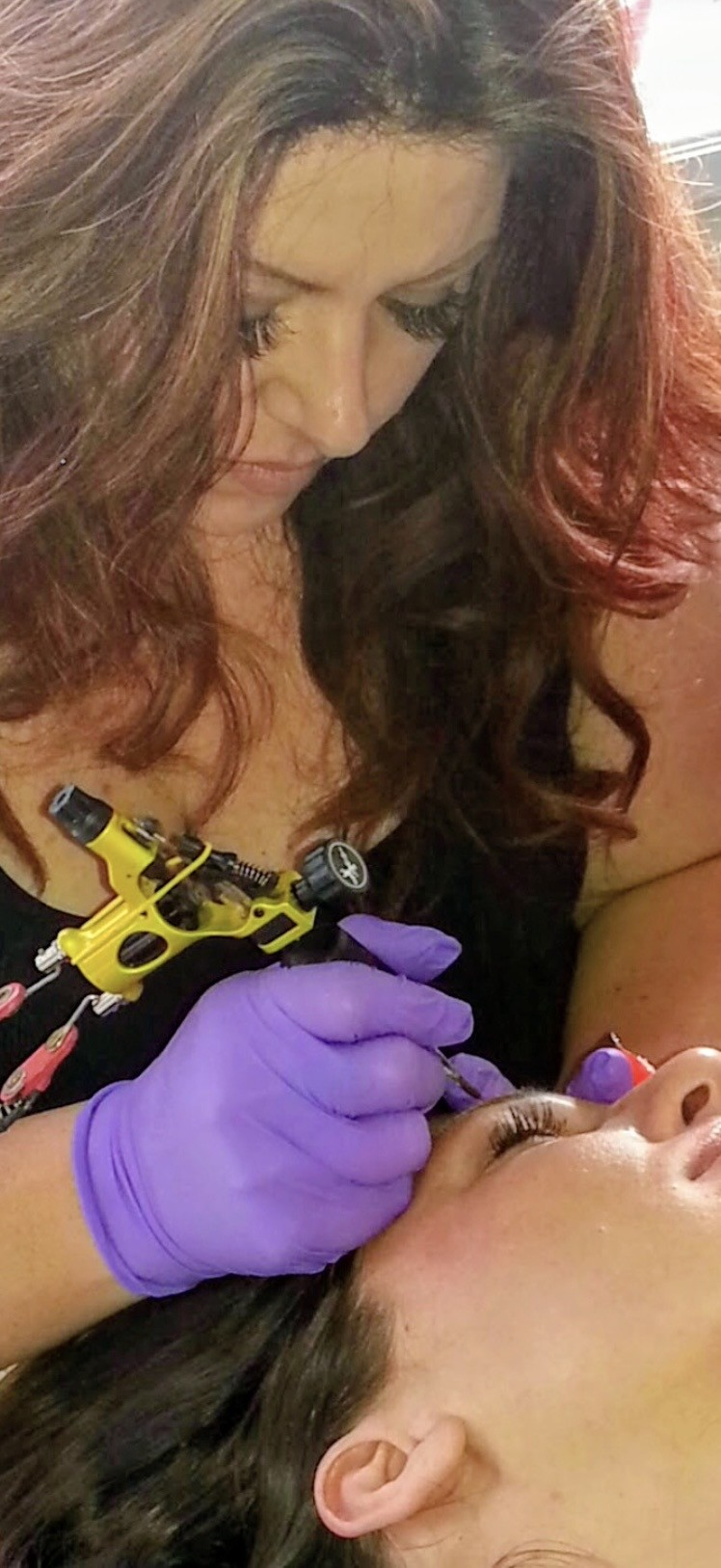 Cristina at work — precision permanent makeup tattooing at Skin Lab Prescott.